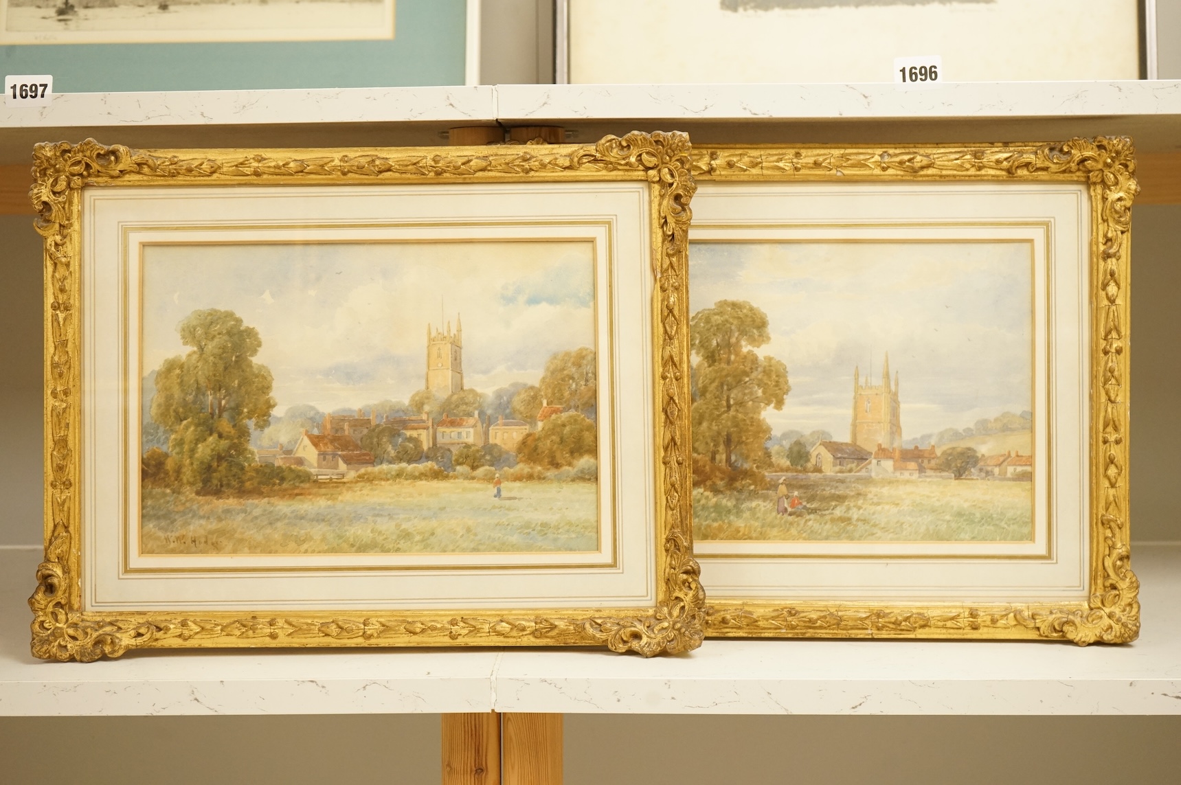 William Woods Hodges (19th. C), Landscapes with churches, signed, pair of watercolours, 19 x 30cm, gilt framed